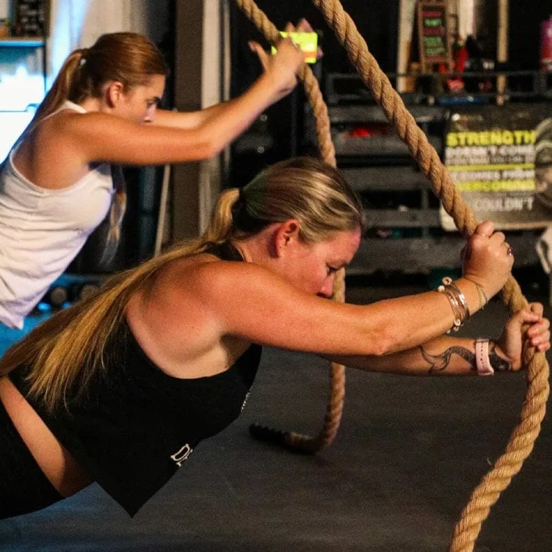 Women pulling ropes
