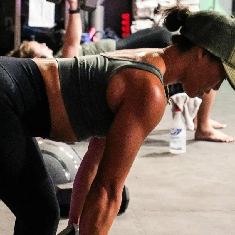 Woman working out with dumbbell
